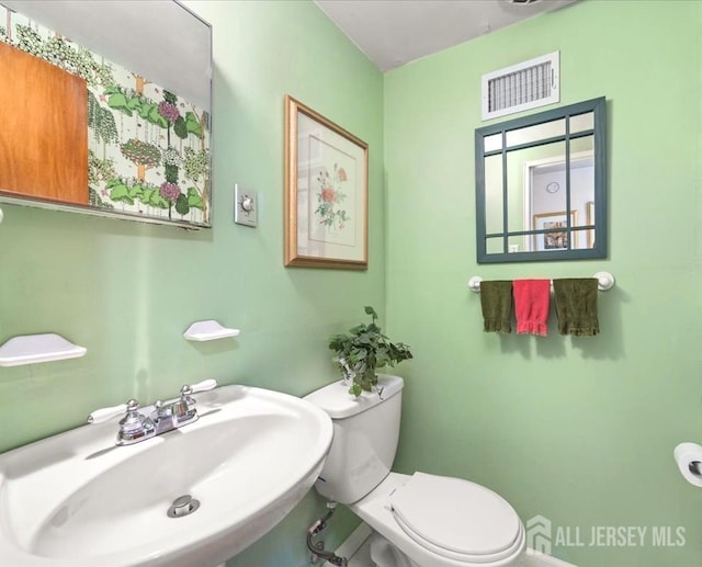 29 Mitchell Ave, Piscataway, NJ 08854 - half bath featuring a sink and toilet