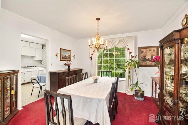 29 Mitchell Ave, Piscataway, NJ 08854 - dining space with dark colored carpet, a chandelier, and ornamental molding