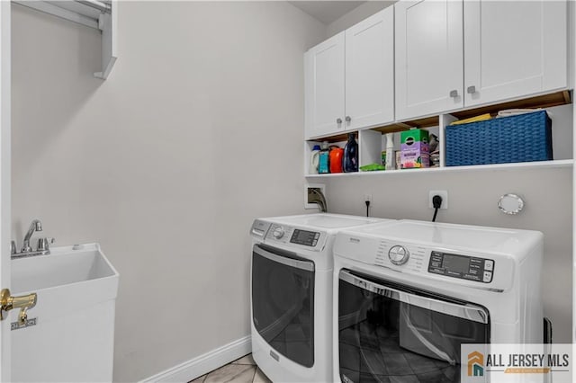 1109 Enclave Cir, Franklin, NJ 08873 - clothes washing area with separate washer and dryer, baseboards, and cabinet space