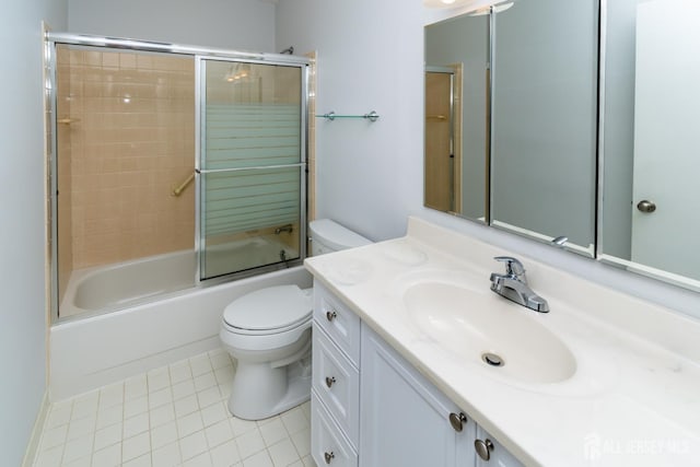 249 Doremus Dr Unit B, Monroe, NJ 08831 - bathroom featuring toilet, vanity, tile patterned floors, and combined bath / shower with glass door