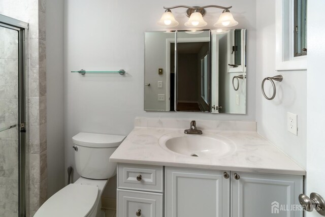 249 Doremus Dr Unit B, Monroe, NJ 08831 - bathroom featuring vanity, toilet, and a stall shower