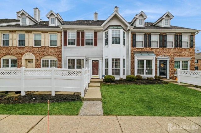 view of property with a front yard