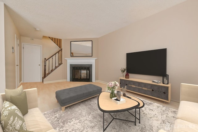 living room featuring a textured ceiling