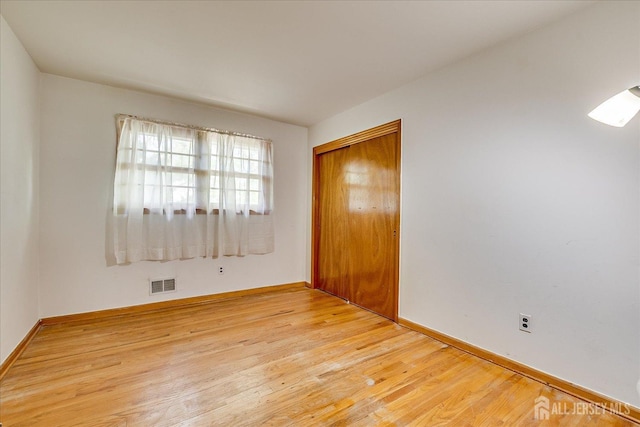 50 Lilac St, Edison, NJ 08817 - spare room featuring wood finished floors and baseboards