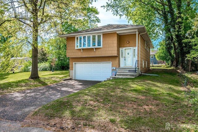 50 Lilac St, Edison, NJ 08817 - view of front of property featuring asphalt driveway, a garage, and a front yard