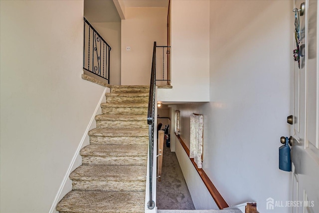50 Lilac St, Edison, NJ 08817 - stairway featuring carpet flooring and baseboards
