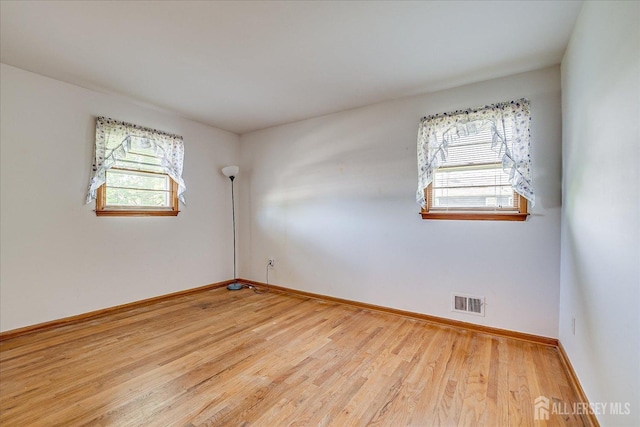 50 Lilac St, Edison, NJ 08817 - unfurnished room featuring wood finished floors and baseboards