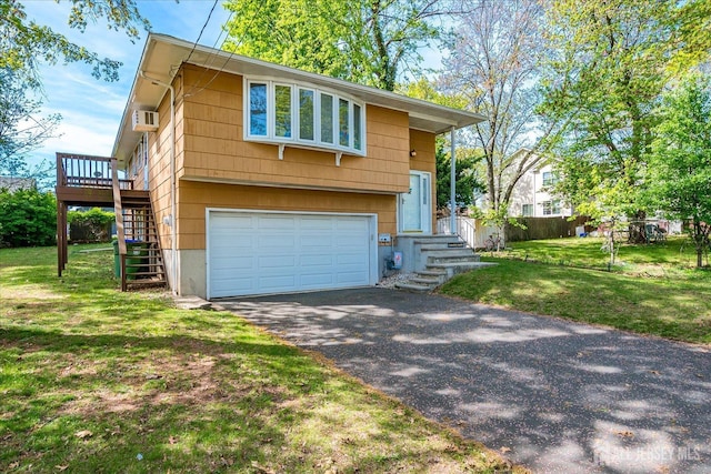 50 Lilac St, Edison, NJ 08817 - view of front of property with an attached garage, stairs, driveway, a wall mounted AC, and a deck