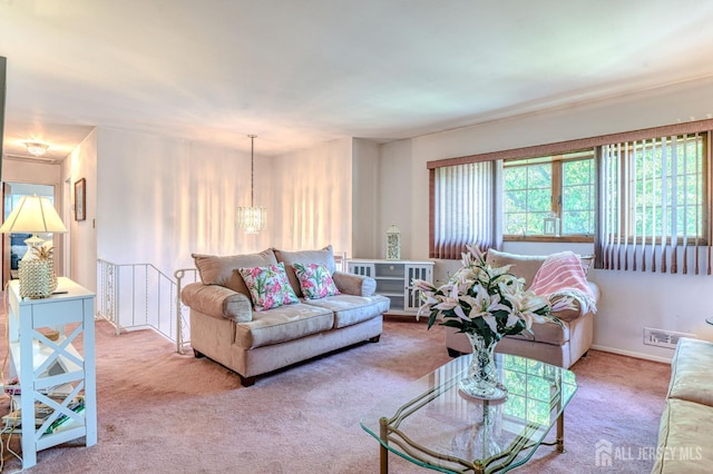 24 Grand Ave, South River, NJ 08882 - living area featuring carpet floors and a chandelier