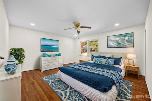 bedroom with a ceiling fan, recessed lighting, baseboards, and wood finished floors