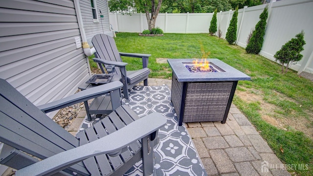 27 Carlton Ave, Monroe, NJ 08831 - view of patio with an outdoor fire pit