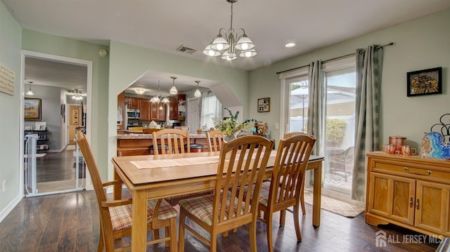 27 Carlton Ave, Monroe, NJ 08831 - dining area with a chandelier, dark wood finished floors, recessed lighting, and baseboards