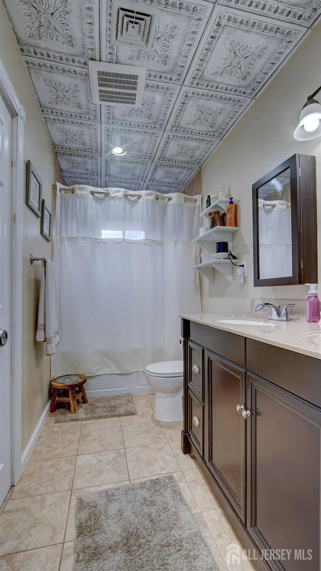 27 Carlton Ave, Monroe, NJ 08831 - full bath featuring toilet, vanity, tile patterned floors, an ornate ceiling, and baseboards