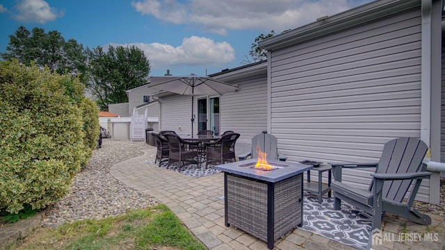 27 Carlton Ave, Monroe, NJ 08831 - view of patio / terrace featuring a fire pit
