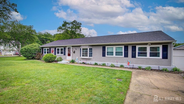27 Carlton Ave, Monroe, NJ 08831 - ranch-style house with a front lawn and roof with shingles