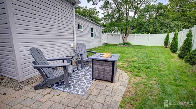 27 Carlton Ave, Monroe, NJ 08831 - view of patio featuring an outdoor fire pit