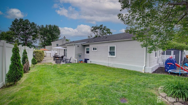 27 Carlton Ave, Monroe, NJ 08831 - back of house with a patio