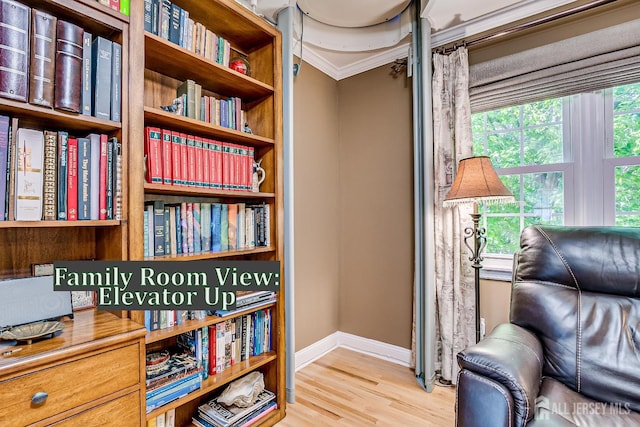 147 Smith St, South Plainfield, NJ 07080 - sitting room with baseboards, wood finished floors, and ornamental molding