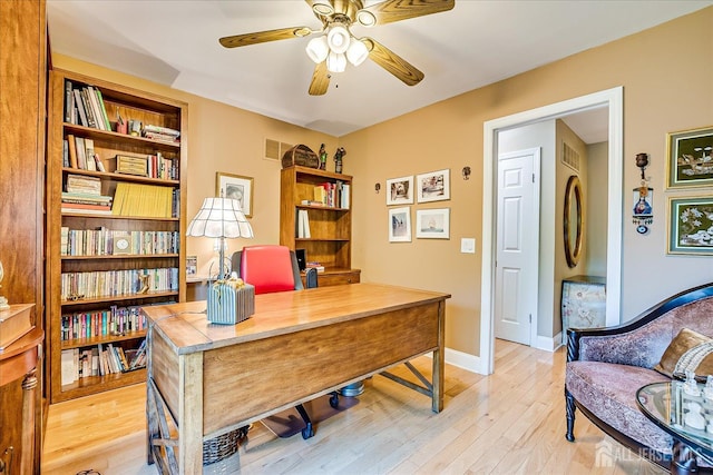 147 Smith St, South Plainfield, NJ 07080 - home office with ceiling fan, light wood-style floors, and baseboards