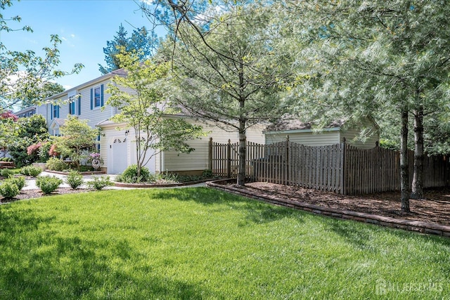 147 Smith St, South Plainfield, NJ 07080 - view of yard featuring an attached garage