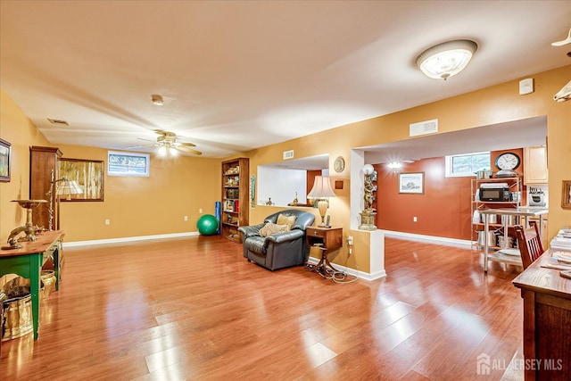 147 Smith St, South Plainfield, NJ 07080 - living room with wood finished floors, ceiling fan, and baseboards