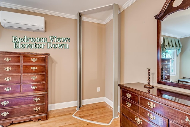 147 Smith St, South Plainfield, NJ 07080 - bedroom featuring an AC wall unit, crown molding, light wood-style floors, and baseboards