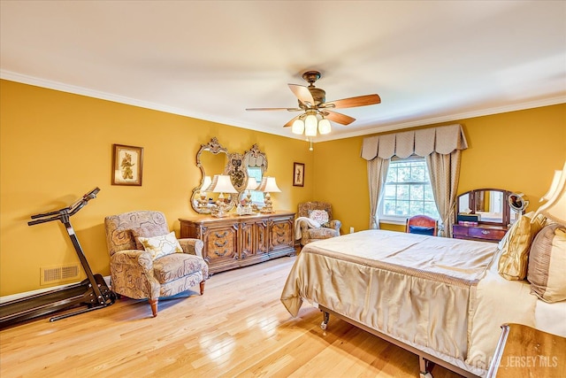 147 Smith St, South Plainfield, NJ 07080 - bedroom featuring ornamental molding, wood finished floors, and a ceiling fan