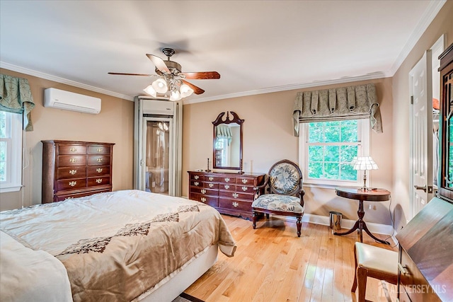147 Smith St, South Plainfield, NJ 07080 - bedroom with a wall unit AC, hardwood / wood-style floors, crown molding, ceiling fan, and baseboards