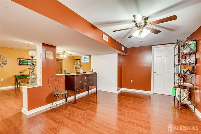 147 Smith St, South Plainfield, NJ 07080 - interior space with ceiling fan, wood finished floors, and baseboards