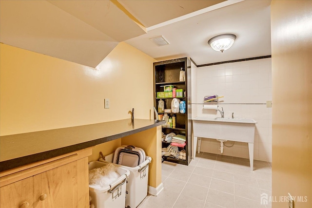 147 Smith St, South Plainfield, NJ 07080 - interior space with tile patterned flooring and tile walls