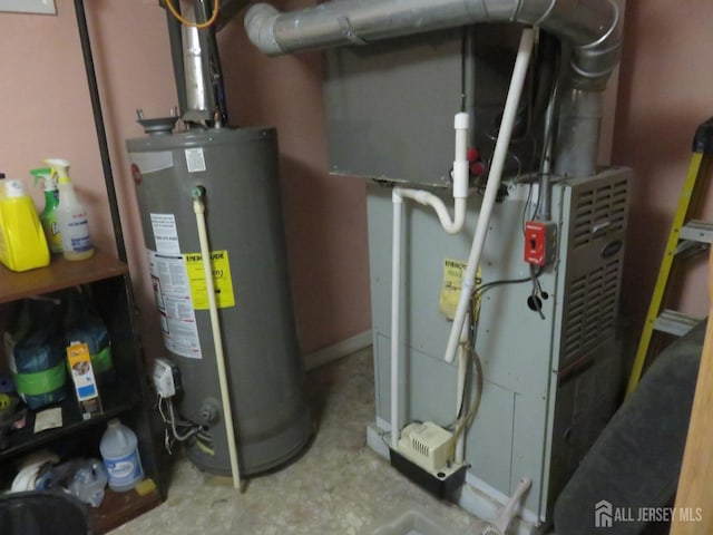 utility room featuring water heater and heating unit