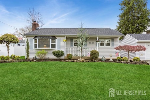 2338 Oxford Ave, South Plainfield, NJ 07080 - view of front of house with a porch, a garage, a chimney, and a shingled roof