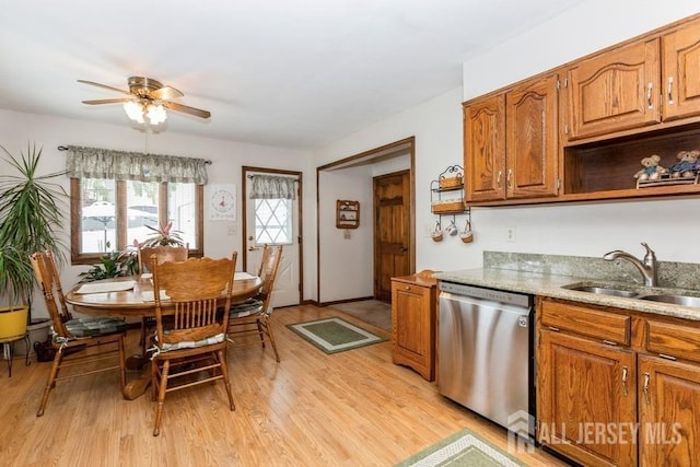 2338 Oxford Ave, South Plainfield, NJ 07080 - kitchen with stainless steel dishwasher, open shelves, a ceiling fan, brown cabinetry, and light wood-type flooring