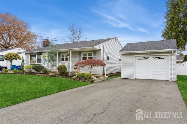 ranch-style home featuring a front lawn, a shingled roof, a chimney, covered porch, and aphalt driveway