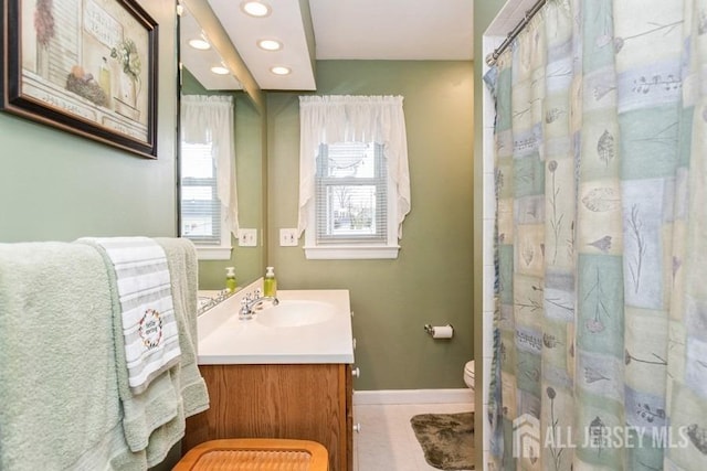 full bath with baseboards, toilet, recessed lighting, tile patterned floors, and vanity