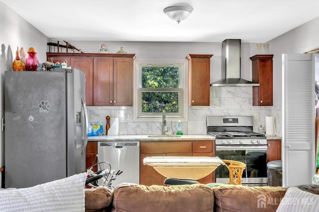 230 Creek Rd, Keansburg, NJ 07734 - kitchen with appliances with stainless steel finishes, wall chimney range hood, a sink, tasteful backsplash, and light countertops