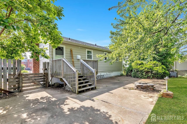 230 Creek Rd, Keansburg, NJ 07734 - view of front of property featuring a patio and roof with shingles
