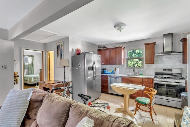 230 Creek Rd, Keansburg, NJ 07734 - kitchen with stainless steel appliances, wall chimney exhaust hood, a sink, light countertops, and open floor plan