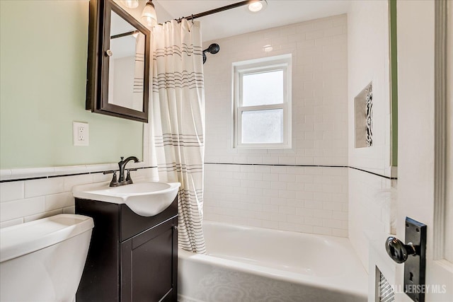 205 Midland Ave, Metuchen, NJ 08840 - bathroom featuring vanity, shower / bath combo, and tile walls