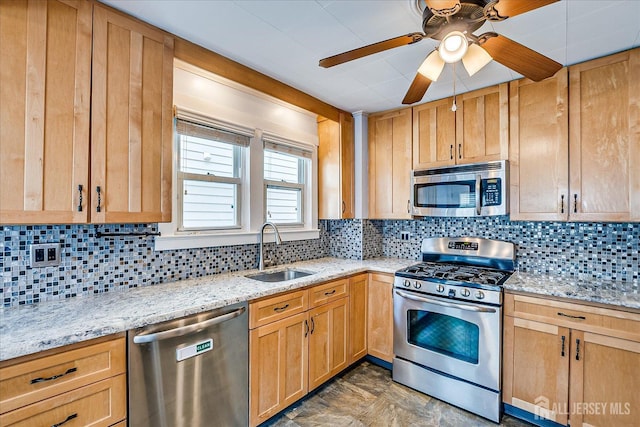 205 Midland Ave, Metuchen, NJ 08840 - kitchen featuring stainless steel appliances, light stone counters, decorative backsplash, and a ceiling fan