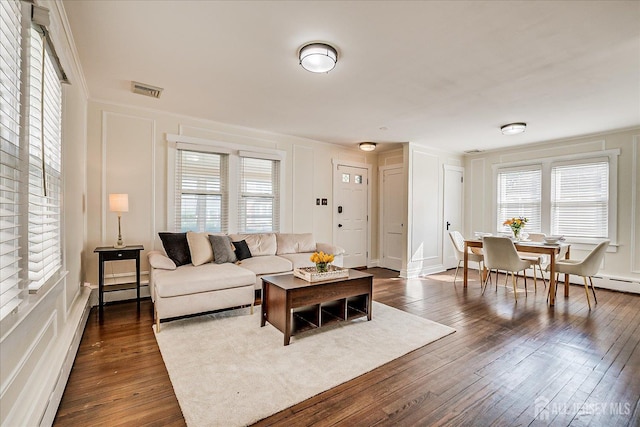 205 Midland Ave, Metuchen, NJ 08840 - living area featuring a decorative wall, dark wood-type flooring, and crown molding