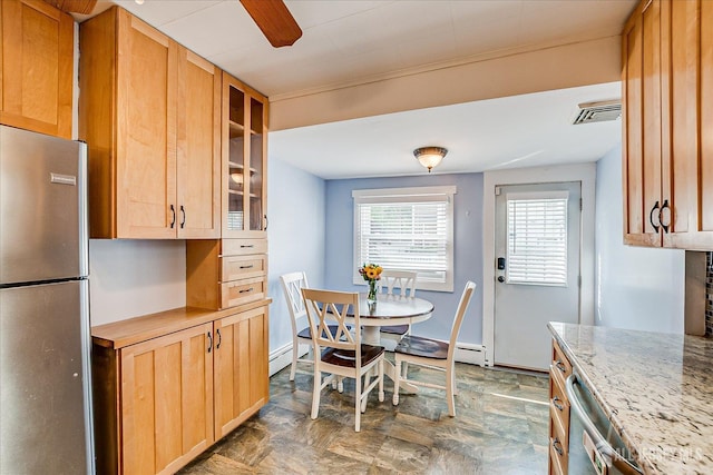 205 Midland Ave, Metuchen, NJ 08840 - dining area featuring a baseboard heating unit and stone finish flooring