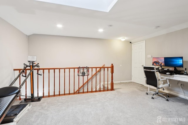carpeted office space featuring baseboards