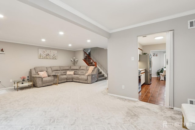 living room with ornamental molding, recessed lighting, stairs, and baseboards