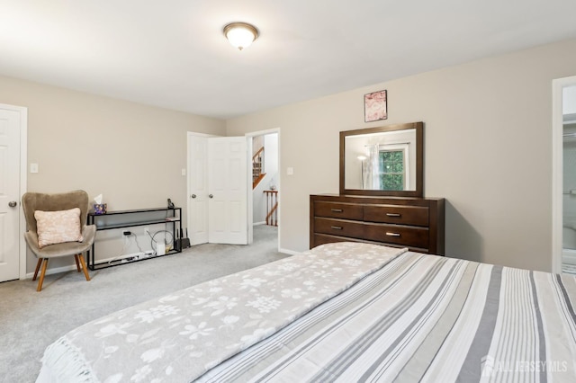 bedroom featuring carpet