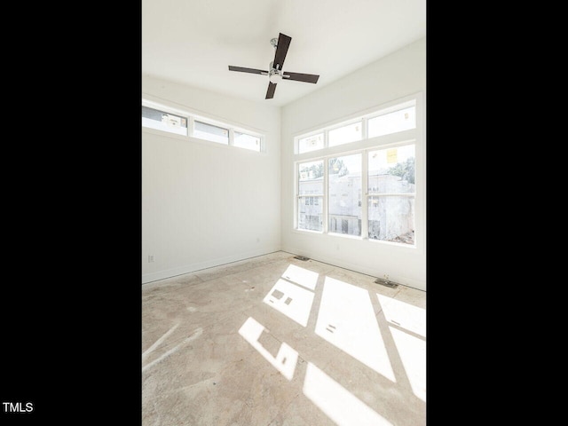 spare room with ceiling fan