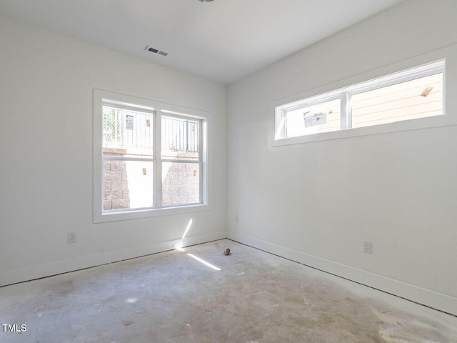 unfurnished room with a wealth of natural light