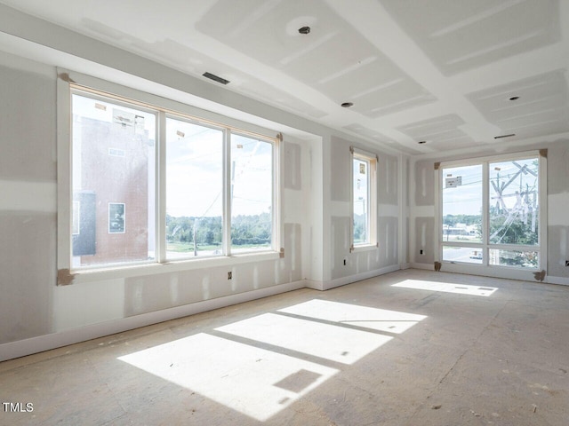 empty room featuring plenty of natural light