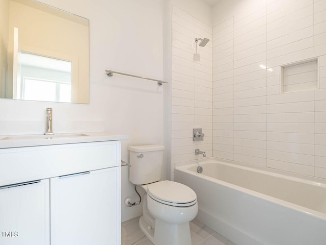 bathroom featuring vanity, toilet, and  shower combination