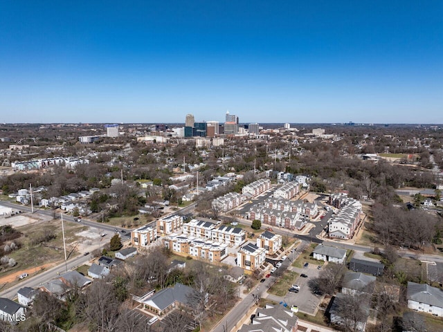 birds eye view of property with a view of city